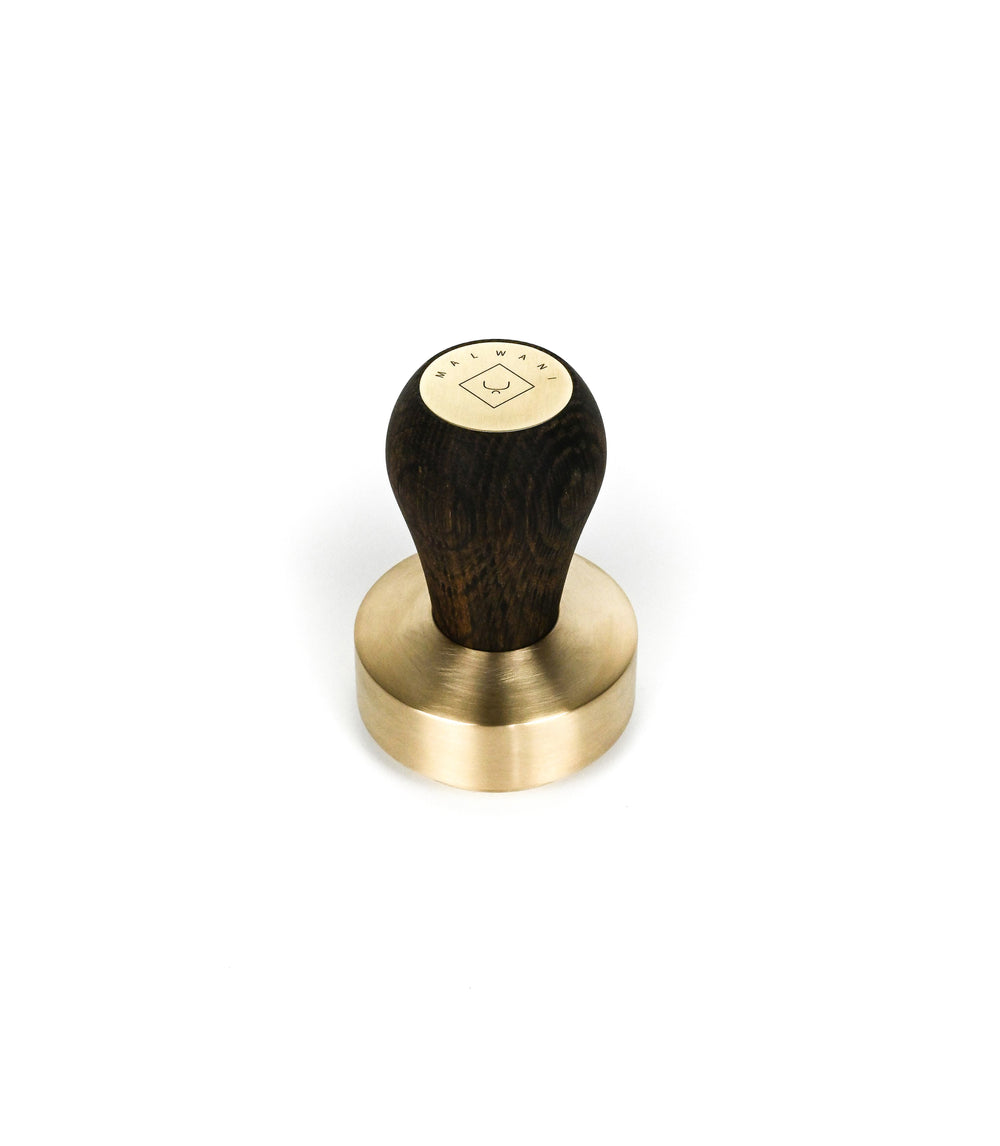 Malwani_Tamper_SmokedOak_brass